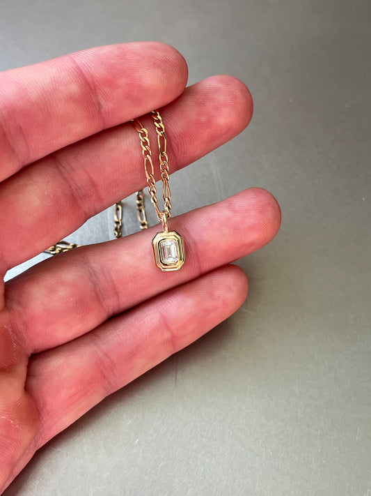 Emerald cut diamond pendant