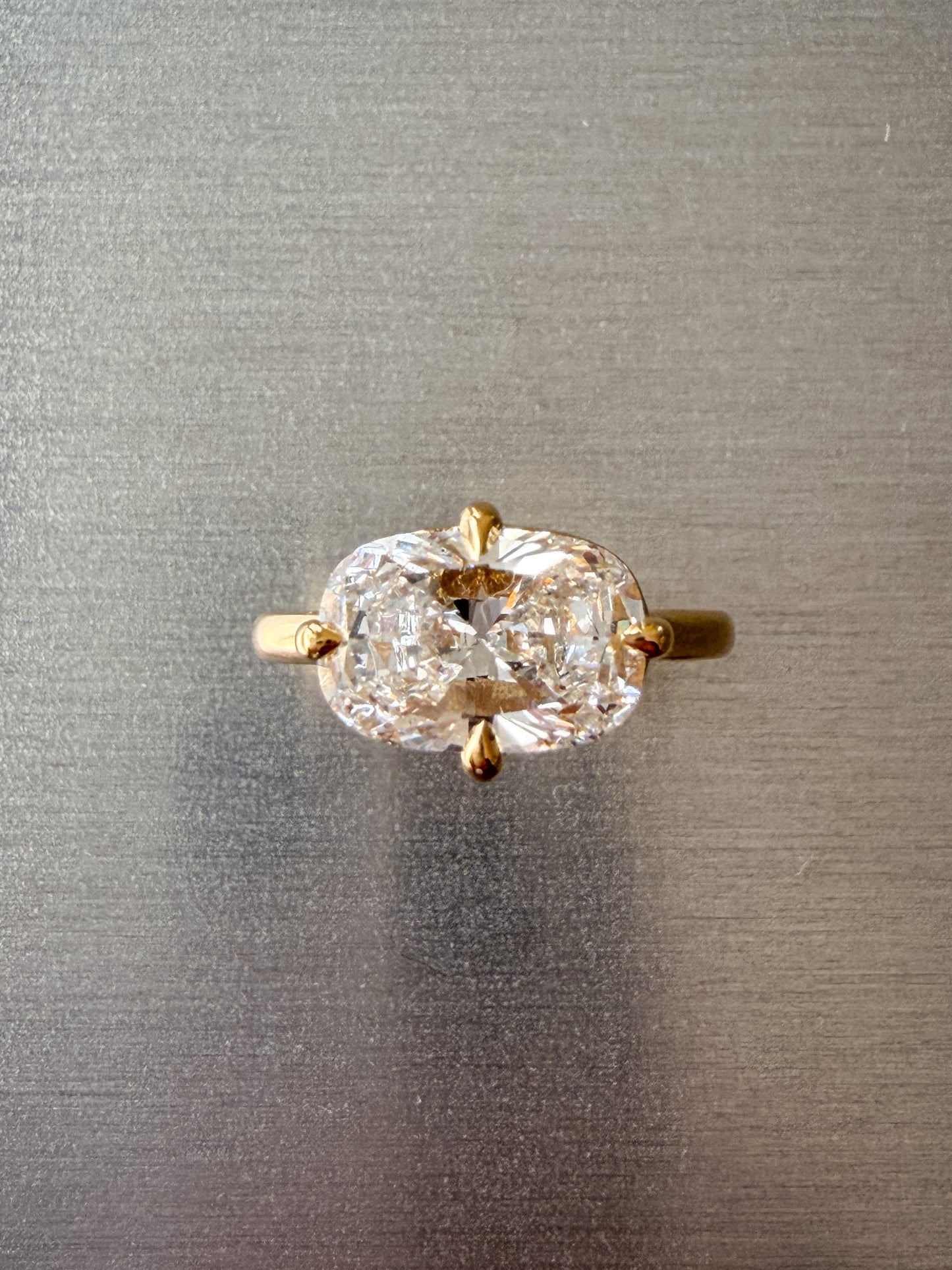 East-West Cushion Cut Diamond Ring