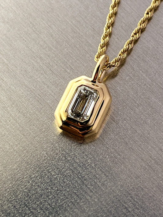 Emerald cut diamond pendant