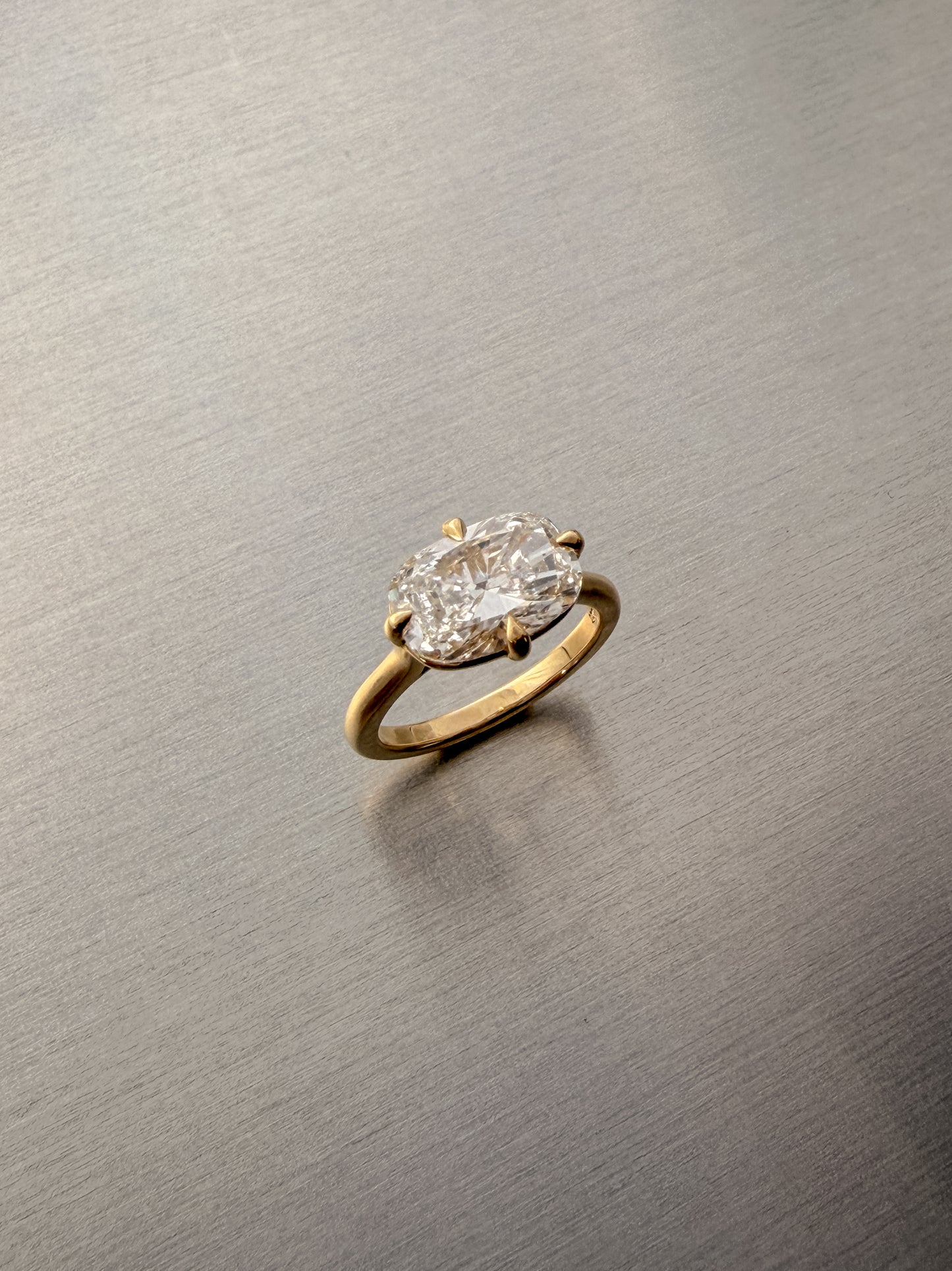 East-West Cushion Cut Diamond Ring