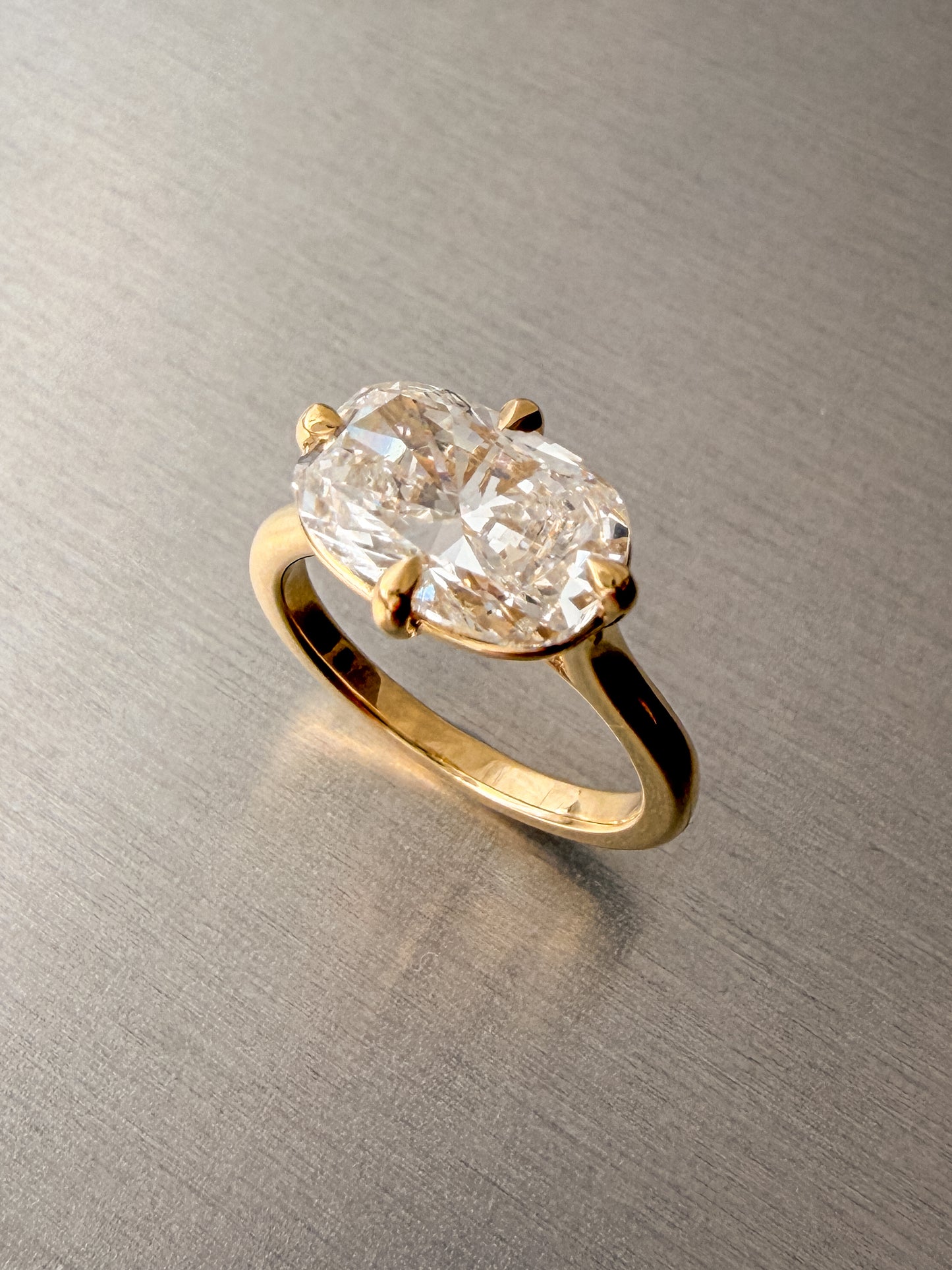 East-West Cushion Cut Diamond Ring